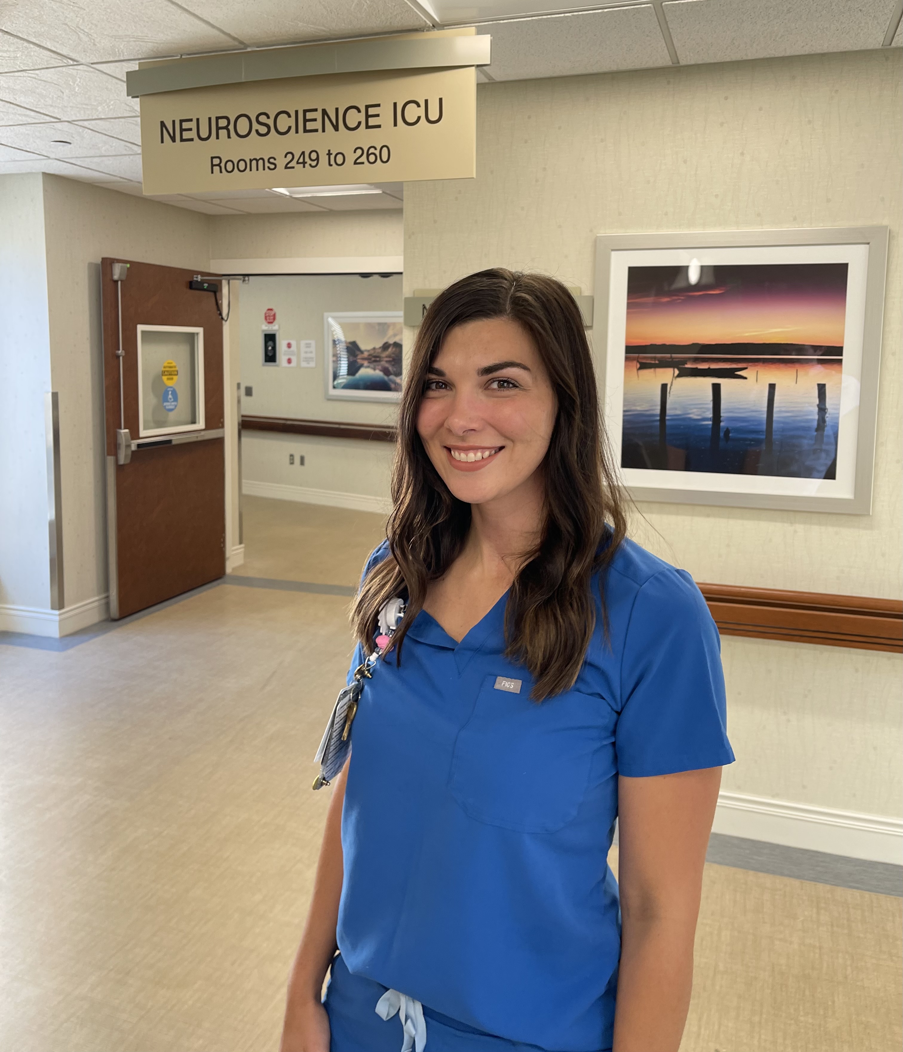Katlin Knox standing in the hallway smiling